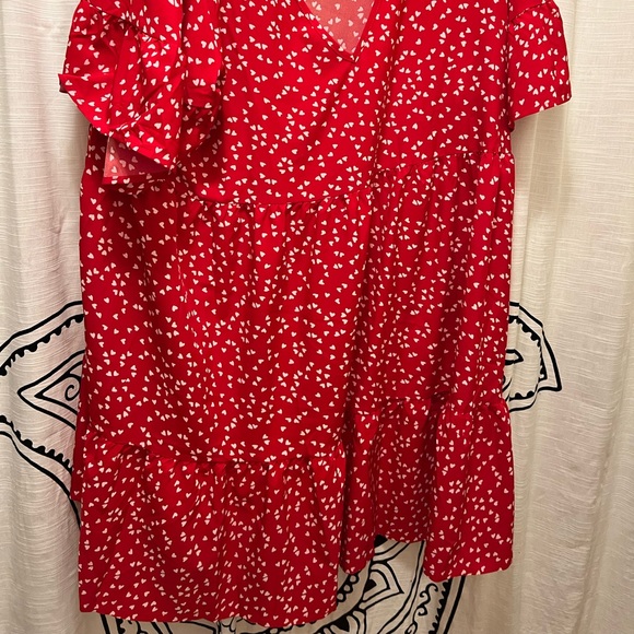 Red dress with white hearts and ruffles on the bottom part of dress. - Picture 5 of 5